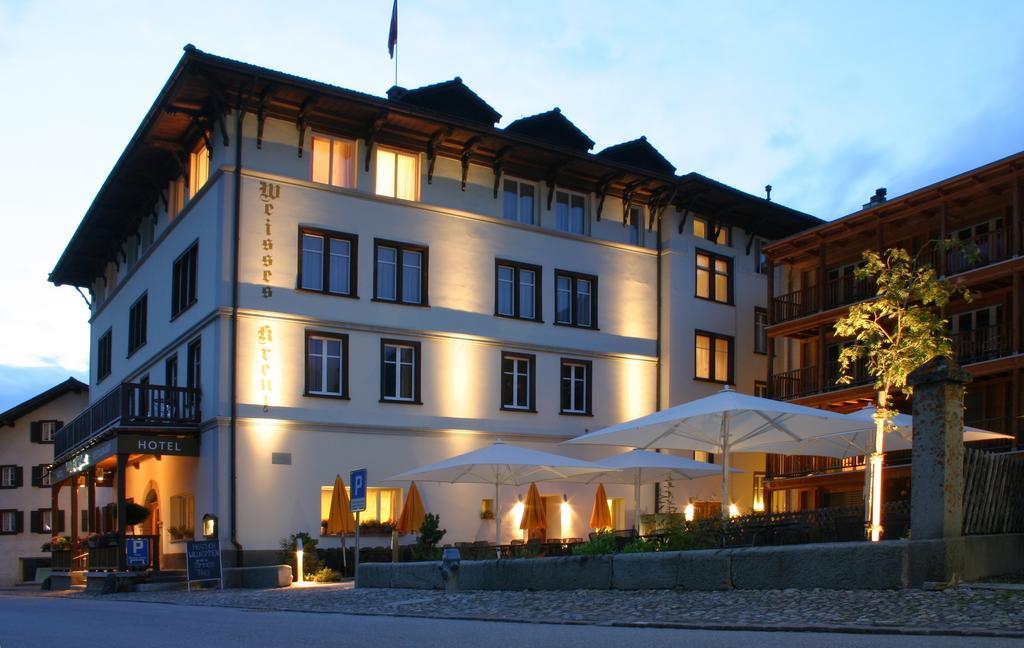 Hotel Weisses Kreuz Berguen Bagian luar foto